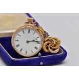 AN EARLY 20TH CENTURY GOLD POCKET WATCH AND PIN, a yellow gold open face pocket watch, round white