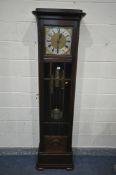 A 20TH CENTURY OAK CHIMING LONGCASE CLOCK, with a full length door, enclosing a brass and silvered