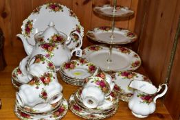 A THIRTY TWO PIECE ROYAL ALBERT OLD COUNTRY ROSES TEA SET, comprising a three tier cake stand, a
