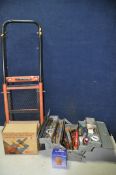 A POWERDEVIL TROLLEY TRUCK along with metal toolbox containing various tools, hammers, files,