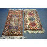 A 20TH CENTURY TURKISH KAZAK RUG, with a cream field, and triple medallions, 126cm x 81cm, and a