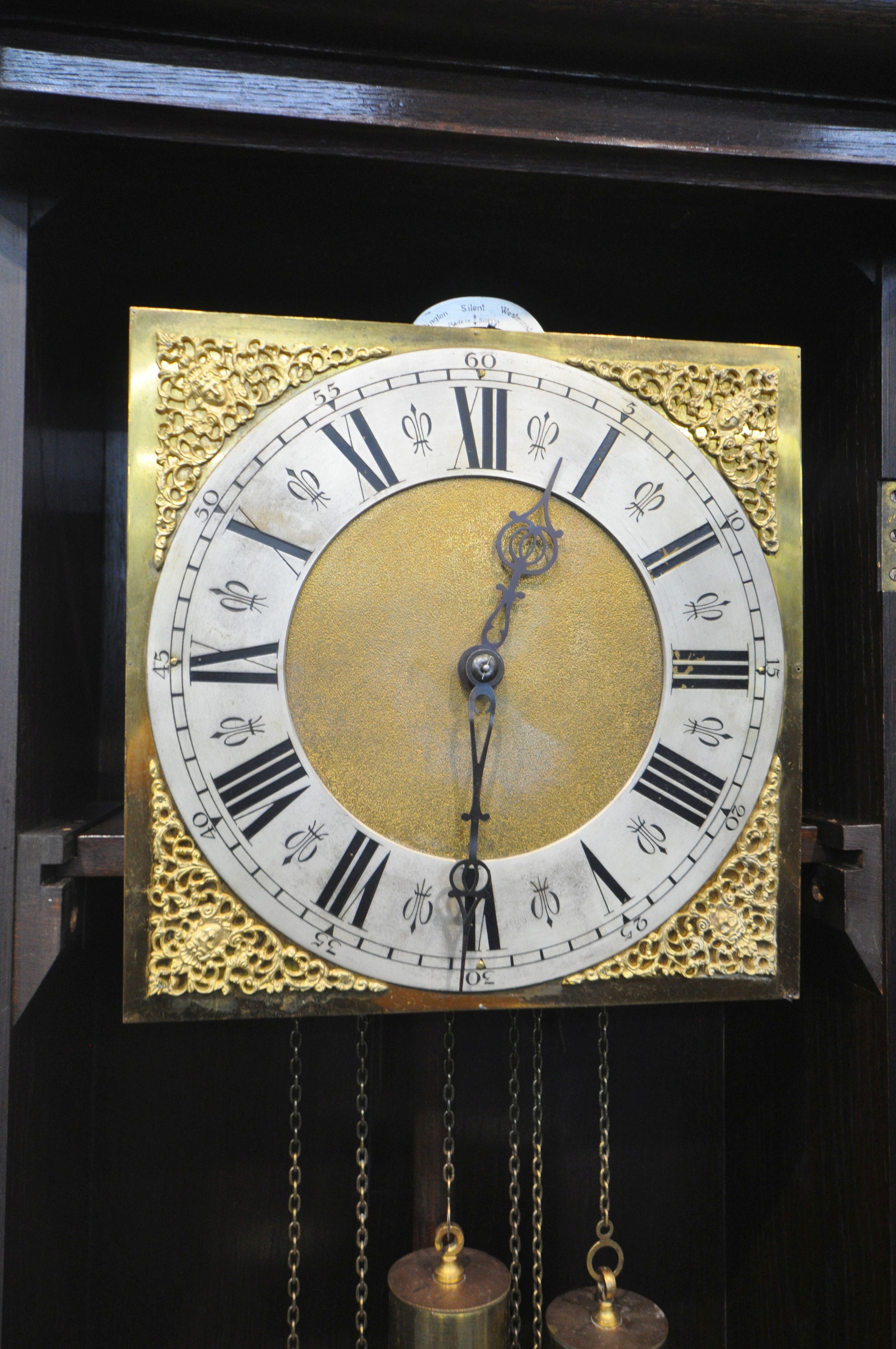 A 20TH CENTURY OAK CHIMING LONGCASE CLOCK, with a full length door, enclosing a brass and silvered - Image 2 of 3