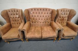 A FAUX LEATHER THREE PIECE LOUNCE SUITE, comprising a two seater sofa, and a pair of armchairs (