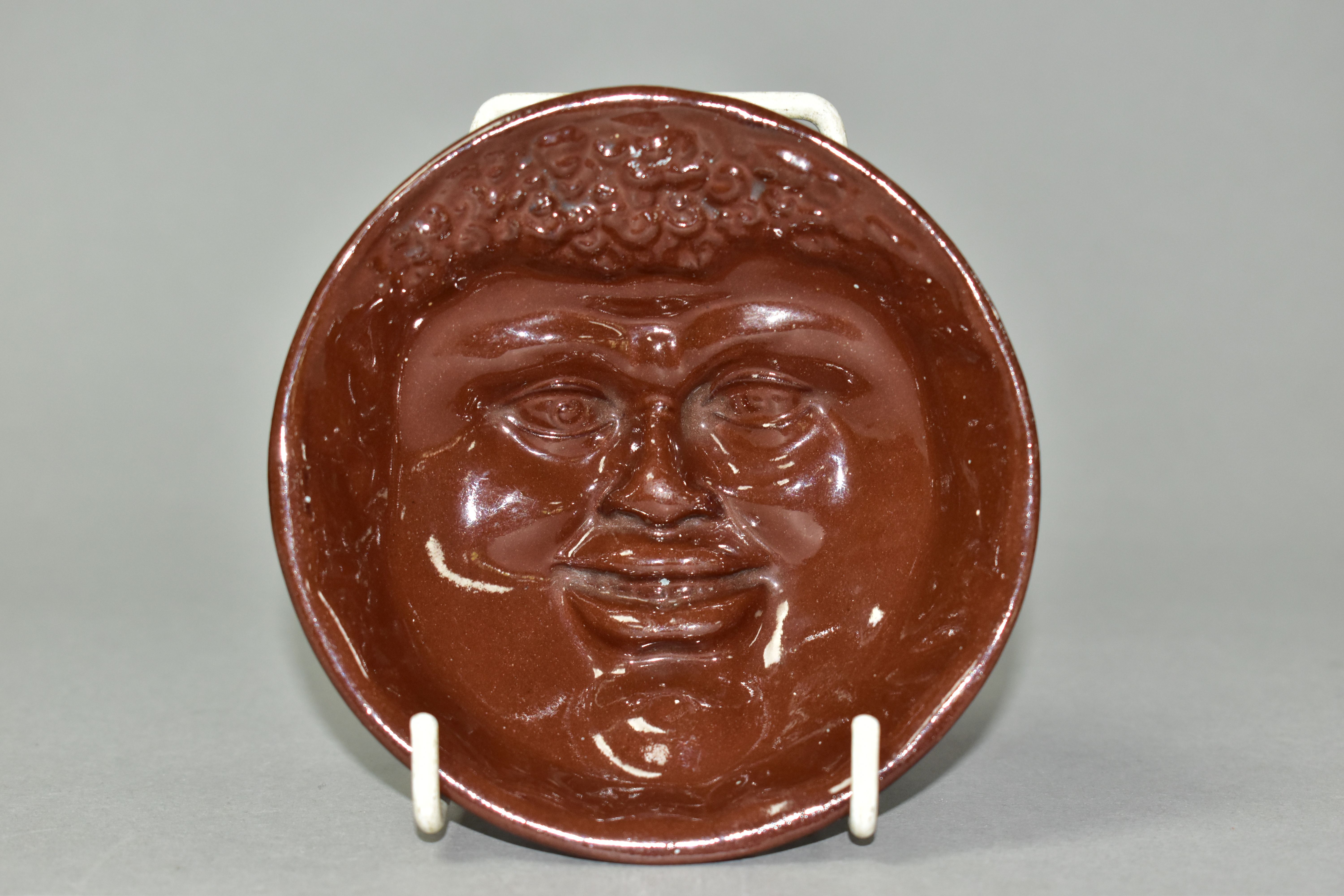 A BROWN GLAZED POTTERY AFRICAN AMERICAN FACE BOWL, the circular bowl with moulded slave? face to the - Image 2 of 6