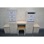 A CREAM FOUR PIECE BEDROOM SUITE, comprising a dressing table with six drawers, length 139cm x depth