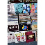 A CASE OF MIXED VINYL SINGLES, a hard case of approximately two hundred and fifty records, mixed