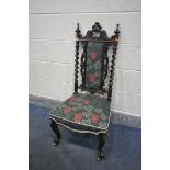 A VICTORIAN ROSEWOOD BARLEY TWIST HALL CHAIR, with floral upholstery, on brass casters (condition:-