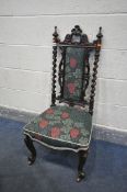 A VICTORIAN ROSEWOOD BARLEY TWIST HALL CHAIR, with floral upholstery, on brass casters (condition:-