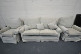 A MULTIYORK THREE PIECE LOUNGE SUITE, comprising a three seater sofa, and two armchairs (condition -