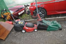 A CHAMPION ELECTRIC LAWN MOWER and a Qualcast electric lawn mower (both untested)