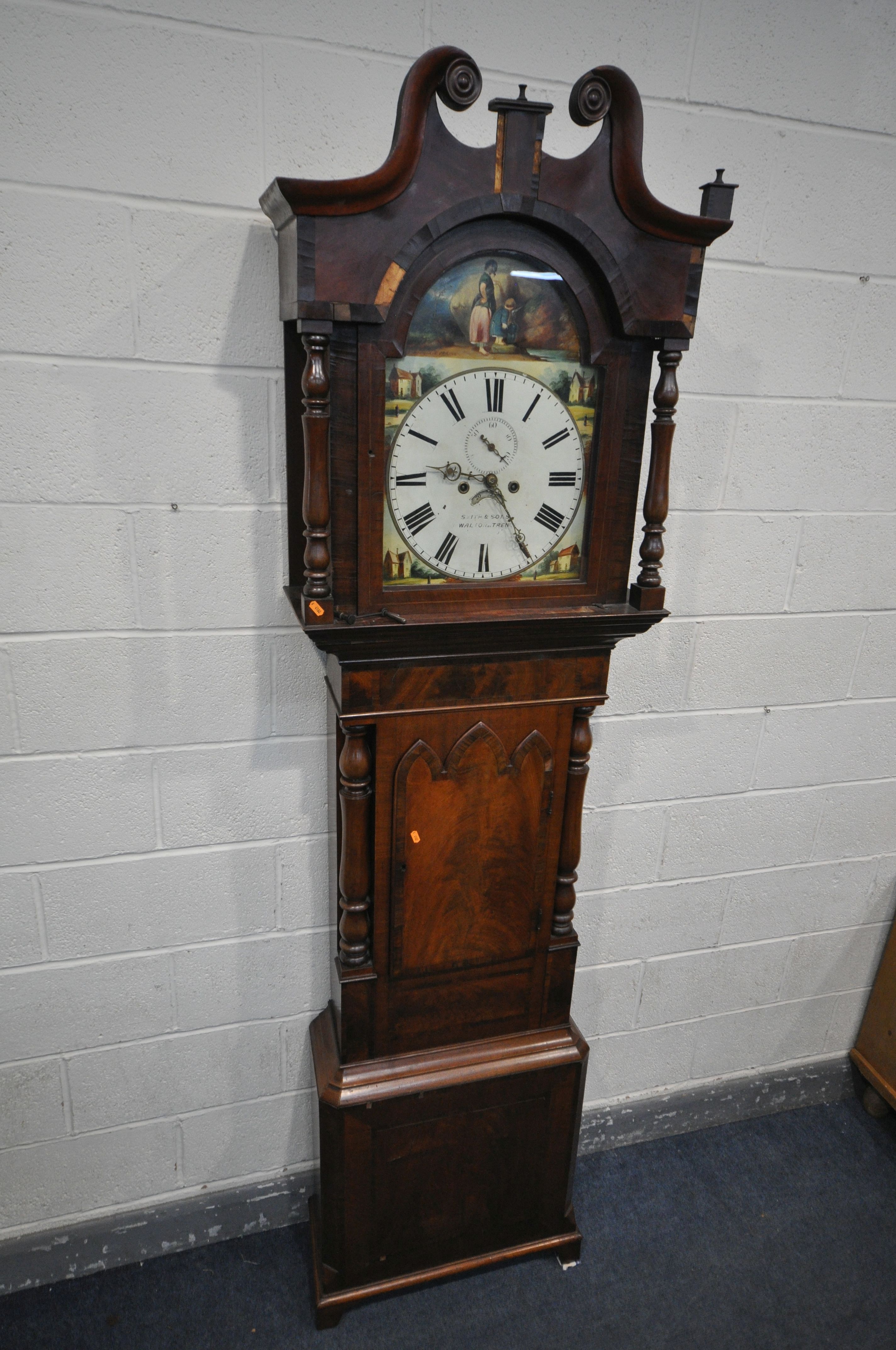 A GEORGIAN FLAME MAHOGANY AND CROSSBANDED EIGHT DAY LONGCASE CLOCK, the hood with swan neck