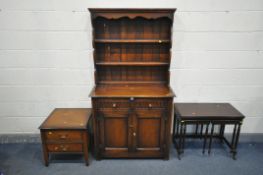 A 20TH CENTURY OAK DRESSER, top with two tier plate rack, base with two drawers over three