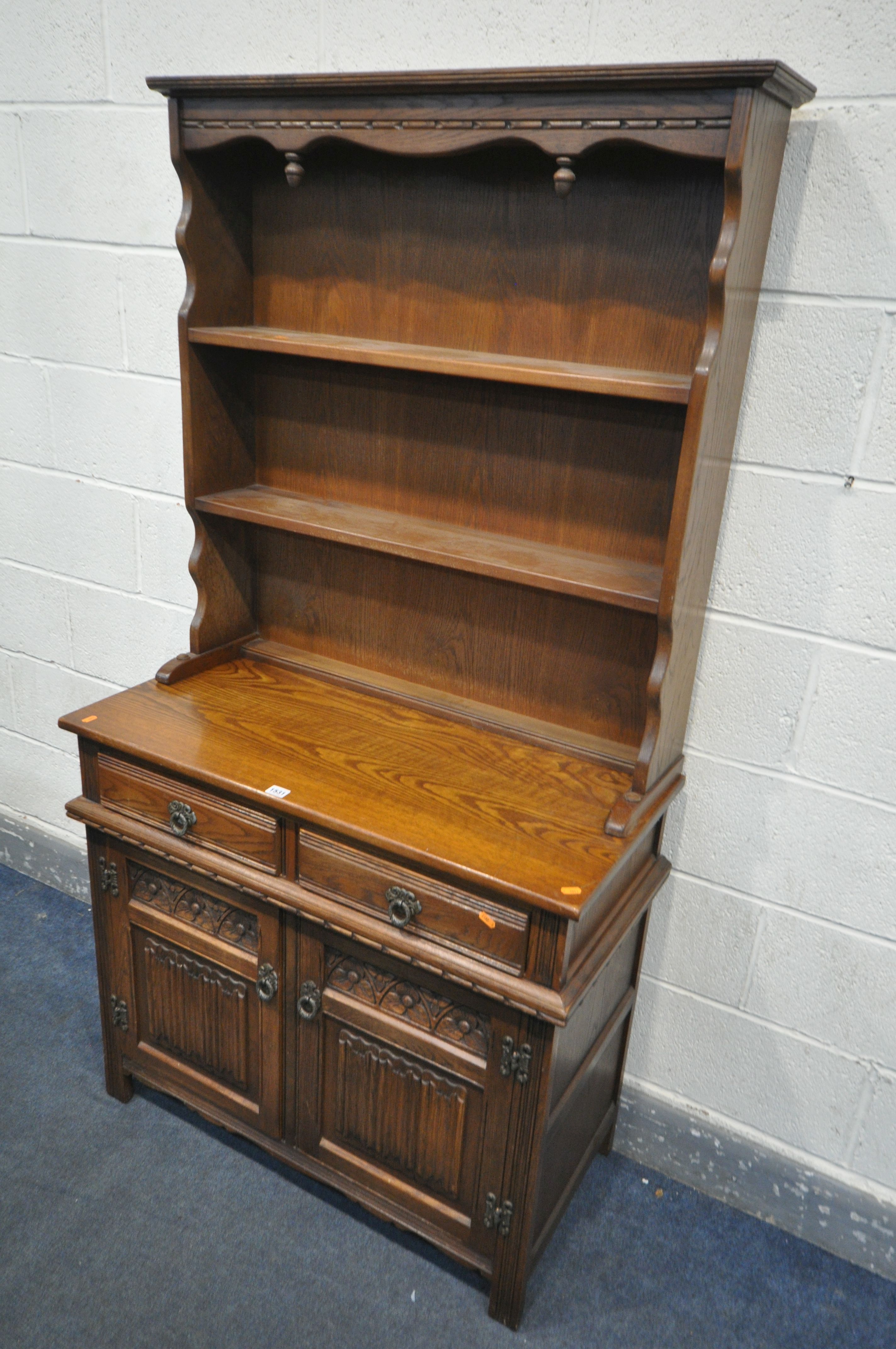 AN OLD CHARM DRESSER, top with two tier plate rack, base with two drawers over two cupboard doors, - Image 2 of 2