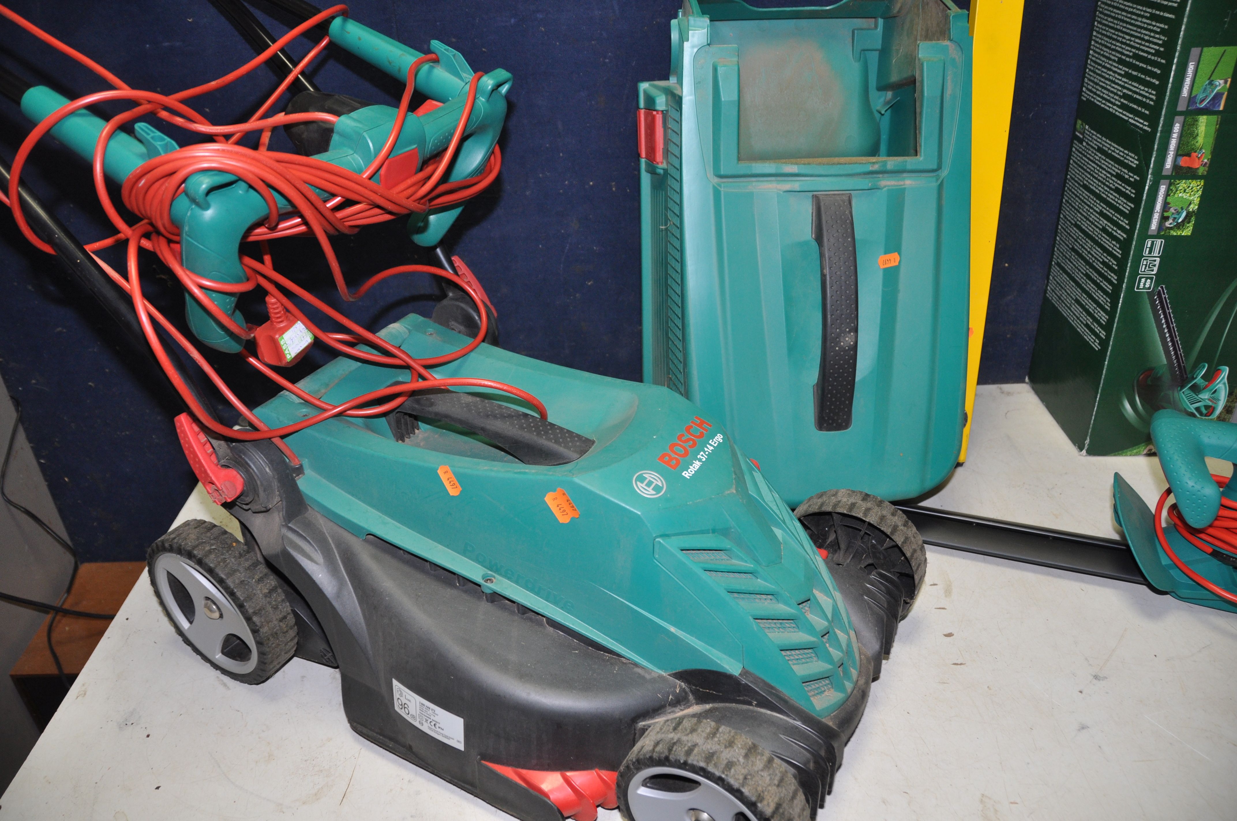 A BOSCH ROTAK 37-14 ERGO LAWN MOWER with grass box along with a Bosch AHS50-16 electric hedge - Bild 3 aus 3