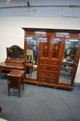 AN EDWARDIAN MAHOGANY THREE PIECE BEDROOM SUITE, comprising a compactum wardrobe with two bevelled