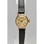 A LADIES 9CT GOLD 'LONGINES' WRISTWATCH, hand wound movement, round champagne dial, signed 'Longines