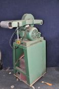 A MULTICO BELT AND DISC SANDER on a rolling stand with a quantity of sanding belts and discs along