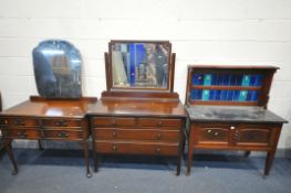 AN ART NOUVEAU MAHOGANY MARBLE TOP WASHSTAND, with a blue tiled back, and double cupboard doors,