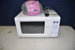 A DAEWOO KOR-1NOA 1000w microwave along with a unbranded pink portable radio/cd player model No CD39