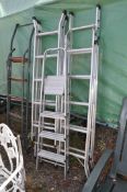 THREE ALUMINIUM STEP LADDERS and a set of steel steps the longest being 190cm