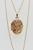 A 9CT GOLD OVAL LOCKET AND CHAIN, oval floral decorated locket, opens to reveal two vacant