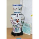 AN ORIENTAL INSPIRED FRANKLIN MINT PORCELAIN VASE, titled 'The Dance of the Celestial Dragon', on