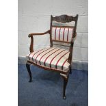 A 19TH CENTURY ROSEWOOD AND MARQUETRY INLAID ELBOW CHAIR, on cabriole front legs, with stripped