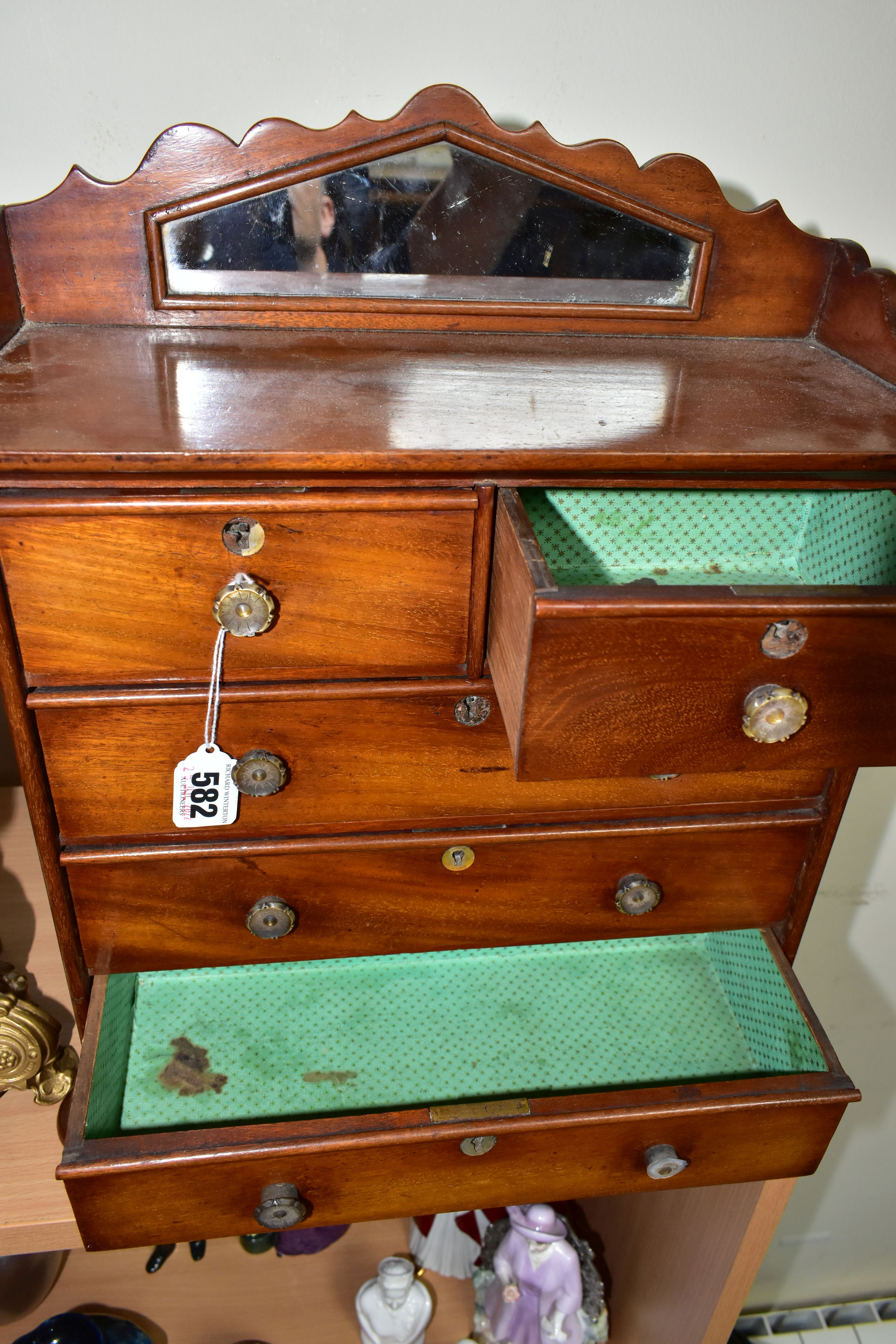 A MINIATURE MAHOGANY CHEST OF DRAWS WITH GALLERIED MIRROR, having two short draws over three long - Image 3 of 7