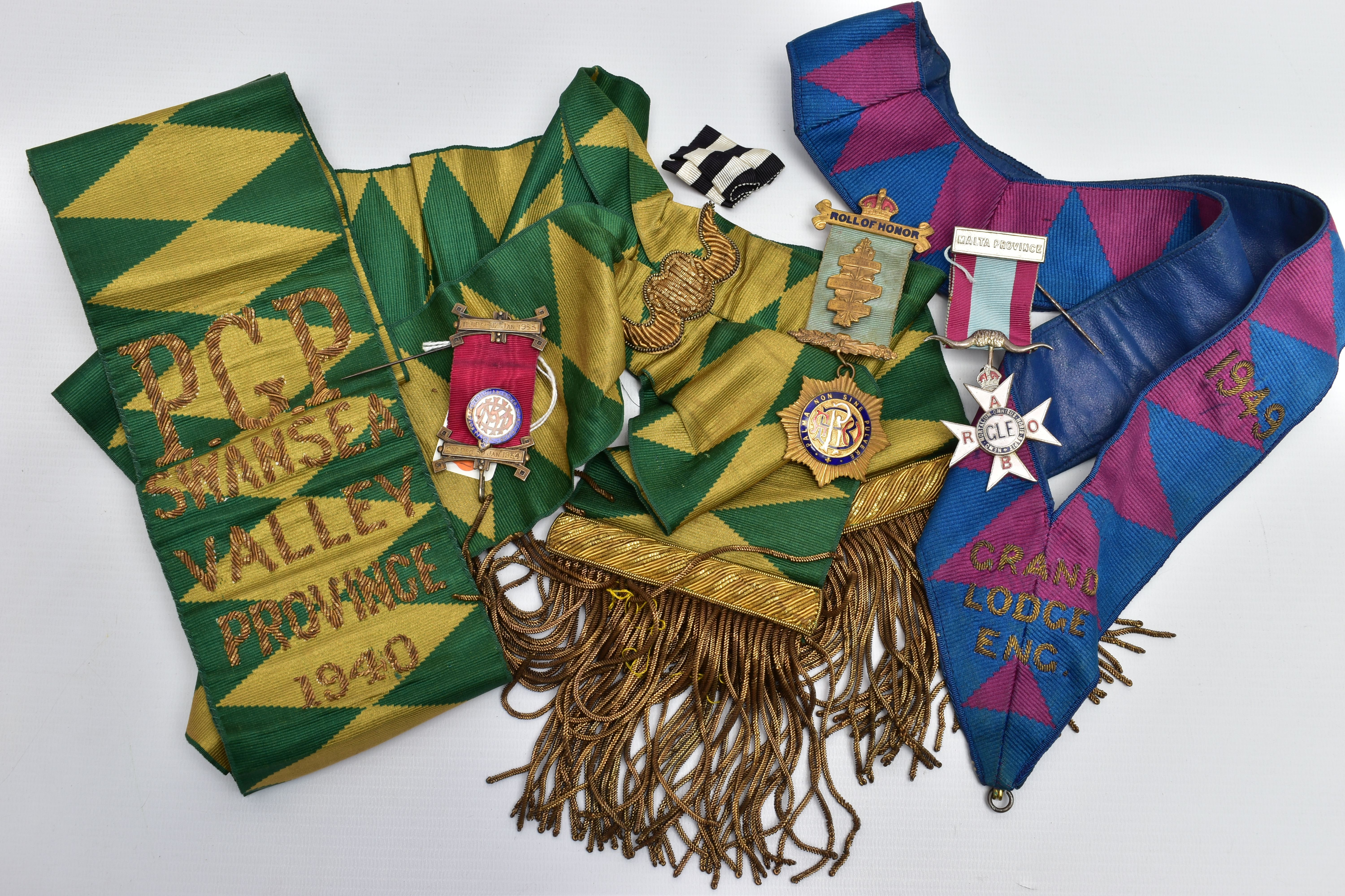 AN ASSORTMENT OF MASONIC MEDALLIONS AND SASHES, to include a yellow metal 'Roll of Honor'