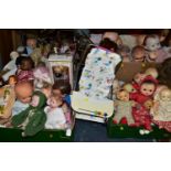 FOUR BOXES OF DOLLS AND SOFT TOYS, to include over forty baby dolls ranging in ages from 1930's,