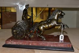 A BRONZE FIGURE OF A ROMAN CHARIOTEER, on a rouge marble base, length 42cm x width 21cm (1) (