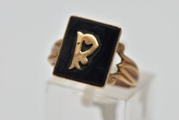 A VICTORIAN INITIAL MOURNING RING, designed with a black rectangular onyx insert, displaying a