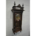 A 20TH CENTURY FRENCH WALNUT WALL CLOCK, with a brassed dial, height 106cm (condition - previous