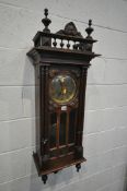 A 20TH CENTURY FRENCH WALNUT WALL CLOCK, with a brassed dial, height 106cm (condition - previous