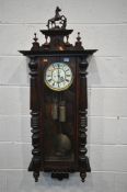 A LATE 19TH CENTURY GUSTAV BECKER VIENNA WALL CLOCK, with a resin horse pediment, the enamel dial