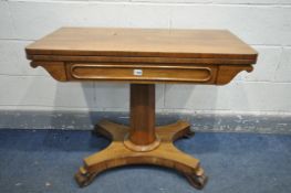 A VICTORIAN ROSEWOOD CARD TABLE, the fold over top enclosing a circular green baize playing surface,