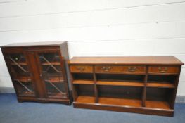 A LOW MAHOGANY OPEN BOOKCASE, with three drawers, width 153cm x depth 32cm x height 83cm, a mahogany