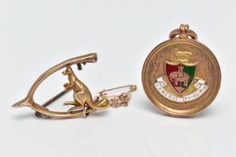 A 9CT GOLD FOB MEDAL AND A YELLOW METAL BROOCH, the fob medal of a circular form, detailed with a