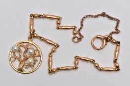 A YELLOW METAL CHARM AND BRACELET, the charm of an oval openwork form depicting a textured tree