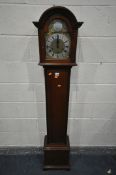 A 20TH CENTURY MAHOGANY CHIMING GRANDAUGHTER CLOCK, the arched door enclosing a brass and silvered 7