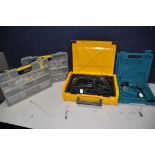 A ATLAS COPCO PFH202 HAMMER DRILL in original case with attachments along with a Makita 6093D