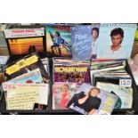 A CASE OF MIXED VINYL SINGLES, a hard case of approximately one hundred and fifty records, largely