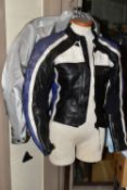 LADIES MOTORCYCLE CLOTHING, comprising a Hein Gericke leather jacket with matching trousers, size 8,