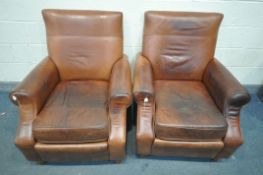 A PAIR OF BROWN LEATHER ARMCHAIRS, width 86cm (stained leather to both chairs)