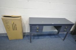 A HABITAT WILDERNESS TWO DRAWER DRESSING TABLE (condition:-brand new in packaging) and a painted