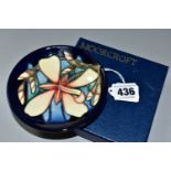 A BOXED MOORCROFT POTTERY 2004 COLLECTORS CLUB PIN DISH, in 'Panache' pattern, having impressed