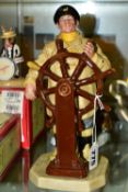 TWO ROYAL DOULTON FIGURES, comprising 'The Helmsman' HN2499 and 'A Good Catch' HN2258 (2) (Condition