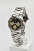A BREITLING NAVITIMER CHRONOGRAPH WRISTWATCH, circa 1970, reference number 806, black dial with