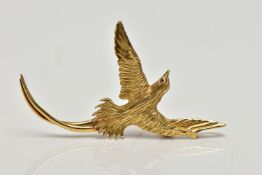 A YELLOW METAL BIRD BROOCH PENDANT, a small brooch depicting a long tailed bird, approximate wing