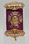 A 9CT GOLD R.A.O.B WITH PURPLE RIBBON, the central panel AF, embossed Buffalo with red enamel